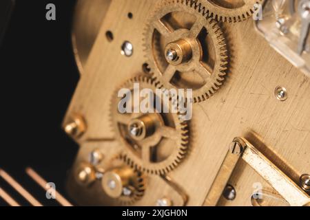 Cogwheels of a vintage clock, close-up photo with selective soft focus Stock Photo