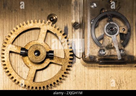 Balance wheel of vintage mantel clock, close-up photo Stock Photo