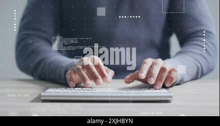 Image of data processing over midsection of biracial man using computer keyboard at desk. Work, connection, business, digital interface and communicat Stock Photo