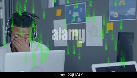 Image of binary coding data processing over african american businessman in office Stock Photo