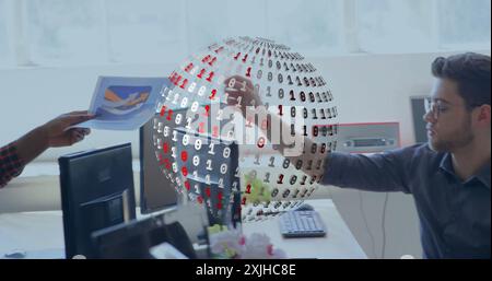 Image of binary coding with globe over diverse business people in office Stock Photo