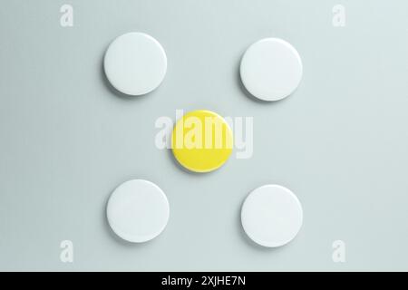 Blank button badges on light background, flat lay. Mockup for design Stock Photo
