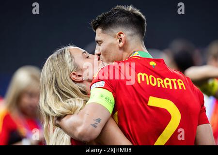 Berlin, Germany. 14th July, 2024. Alvaro Morata (R) of Spain kisses his wife Alice Campello-Morata (L) during the ceremony after the UEFA EURO 2024 final match between Spain and England at Olympiastadion Berlin. Final score: Spain 2:1 England. (Photo by Mikolaj Barbanell/SOPA Images/Sipa USA) Credit: Sipa USA/Alamy Live News Stock Photo