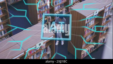 Image of ai text and data processing over biracial girl learning in library Stock Photo