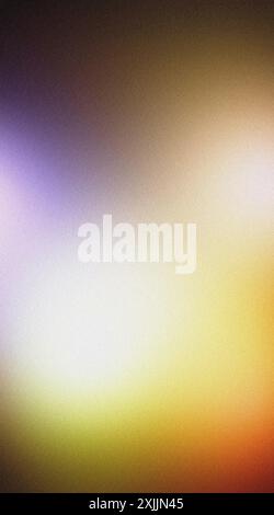 Abstract background featuring a smooth transition of colors, blending warm and cool tones with a subtle grain texture Stock Photo
