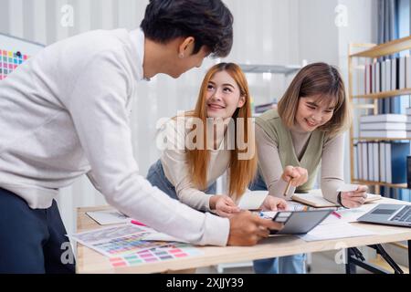 Creative Team Collaborating on UX UI Design Project in Modern Office ...