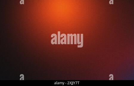 Abstract background with fading orange light over a dark red backdrop with a textured grainy effect Stock Photo