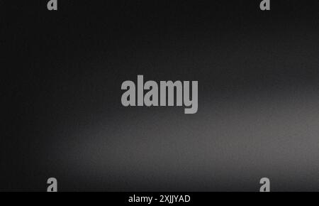 Black gradient background with a soft highlighted noise grain texture Stock Photo