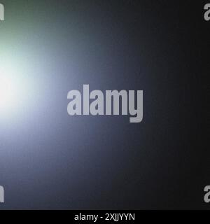 Light beam spreading from upper left corner against dark background with space for text Stock Photo