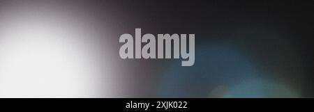Abstract background with light leak and grainy texture, creating a blurred gradient from white to black Stock Photo