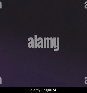 Dark purple background with subtle gradient and a grainy texture Stock Photo