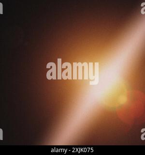 Background with a grainy texture and light rays, enhanced by a lens flare effect Stock Photo