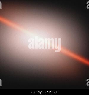 Abstract background created by a red light beam crossing a textured surface Stock Photo