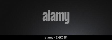 Dark grainy background with a slight gradient lighting from the bottom Stock Photo