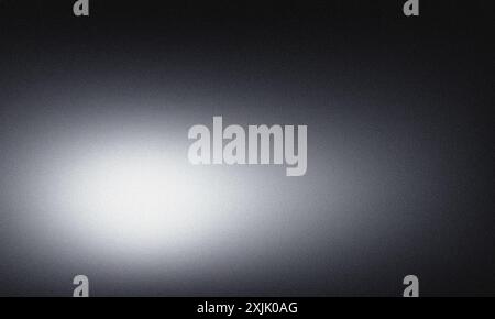 Smooth transition created by a black and white grainy gradient background Stock Photo