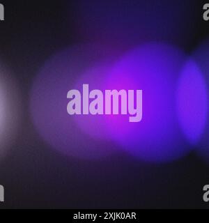 Textured background with grainy details and soft purple and violet lights Stock Photo