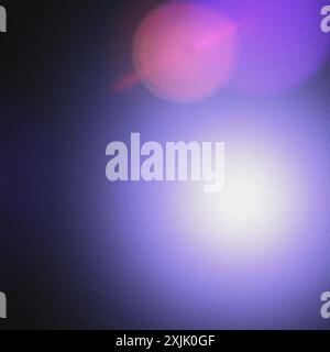 Abstract background with grainy texture and purple and pink lens flare Stock Photo