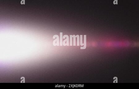 Abstract grainy texture background with a horizontal light beam crossing Stock Photo