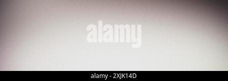 Panoramic gradient from white to black creates a textured background with a grainy finish Stock Photo