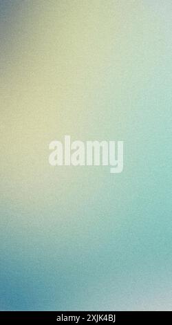 Abstract background featuring a grainy gradient fading from light yellow to pastel blue Stock Photo