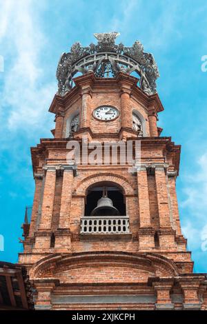 Puerto Vallarta, Mexico - March 27, 2019: Historic clock tower against a clear blue sky. Stock Photo