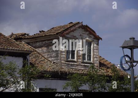 A beautiful shot of an old abandoned house against blue sky on a sunny day in Heidelberg, Germany Stock Photo