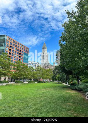 View of a public park and skyscrapers, the clock on the Custom House in Boston Stock Photo