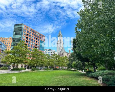 View of a public park and skyscrapers, the clock on the Custom House in Boston Stock Photo