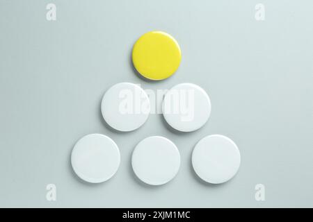 Blank button badges on light background, flat lay. Mockup for design Stock Photo
