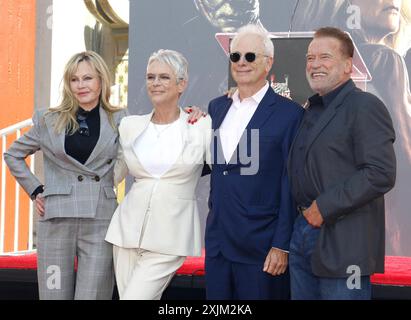 Melanie Griffith, Jamie Lee Curtis, Christopher Guest and Arnold Schwarzenegger at Jamie Lee Curtis hand and footprint in cement ceremony held at the Stock Photo