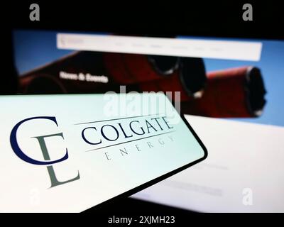 Stuttgart, Germany, 07-16-2022: Mobile phone with logo of American oil and gas company Colgate Energy LLC on screen in front of website. Focus on Stock Photo