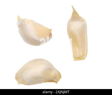 Top view set of 3 unpeeled garlic cloves isolated on a white background Stock Photo