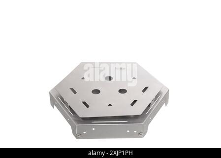 Durable hexagonal metal plate with multiple cutouts, perfect for industrial and commercial applications. Stock Photo