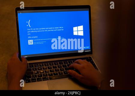 Zagreb, Croatia. 19th July, 2024. Photo taken on July 19, 2024. in Zagreb, Croatia shows a blue error screen, also known as the 'Blue Screen of Death' (BSOD) on a laptop screen. Millions of Windows users across the globe today experienced the Blue Screen of Death (BSOD) error which caused the system to suddenly shut down or restart. Photo: Igor Kralj/PIXSELL Credit: Pixsell/Alamy Live News Stock Photo
