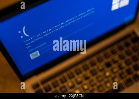 Zagreb, Croatia. 19th July, 2024. Photo taken on July 19, 2024. in Zagreb, Croatia shows a blue error screen, also known as the 'Blue Screen of Death' (BSOD) on a laptop screen. Millions of Windows users across the globe today experienced the Blue Screen of Death (BSOD) error which caused the system to suddenly shut down or restart. Photo: Igor Kralj/PIXSELL Credit: Pixsell/Alamy Live News Stock Photo