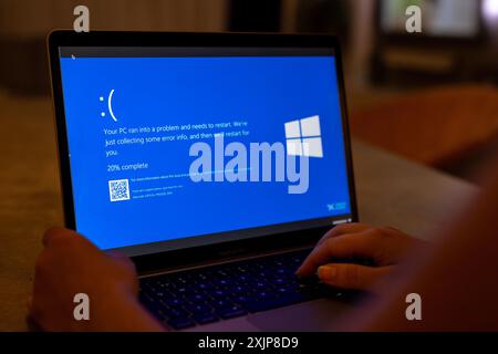 Zagreb, Croatia. 19th July, 2024. Photo taken on July 19, 2024. in Zagreb, Croatia shows a blue error screen, also known as the 'Blue Screen of Death' (BSOD) on a laptop screen. Millions of Windows users across the globe today experienced the Blue Screen of Death (BSOD) error which caused the system to suddenly shut down or restart. Photo: Igor Kralj/PIXSELL Credit: Pixsell/Alamy Live News Stock Photo