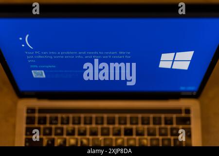 Zagreb, Croatia. 19th July, 2024. Photo taken on July 19, 2024. in Zagreb, Croatia shows a blue error screen, also known as the 'Blue Screen of Death' (BSOD) on a laptop screen. Millions of Windows users across the globe today experienced the Blue Screen of Death (BSOD) error which caused the system to suddenly shut down or restart. Photo: Igor Kralj/PIXSELL Credit: Pixsell/Alamy Live News Stock Photo