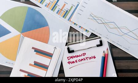 Concept of Demand Forecasting write on paperwork isolated on wooden background. Stock Photo