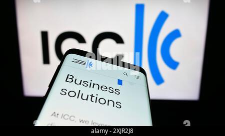 Stuttgart, Germany, 12-08-2023: Smartphone with website of organisation International Chamber of Commerce (ICC) in front of logo. Focus on top-left Stock Photo