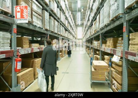 Warehouse aisle in an IKEA store. Founded in 1943, IKEA is the world's largest furniture retailer. IKEA operates 351 stores in 43 countries. Italy Stock Photo