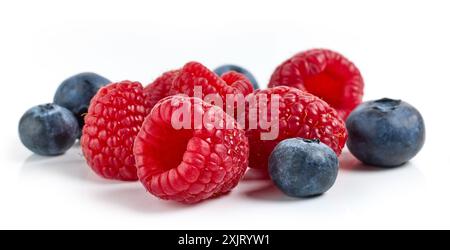 fresh raspberries and blueberries isolated on white background Stock Photo