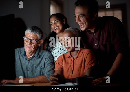 Creative, team and smile in office at night with computer for creating blog post, online and developing content strategy. Copywriter, group and Stock Photo