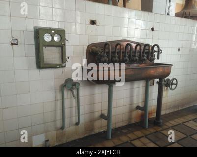 Limassol, Cyprus - July 13, 2018: Vintage Interior of the brewery, Round cooper storage tanks for beer fermentation and maturation Stock Photo