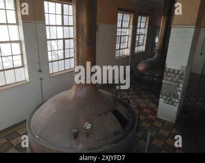 Limassol, Cyprus - July 13, 2018: Vintage Interior of the brewery, Round cooper storage tanks for beer fermentation and maturation Stock Photo