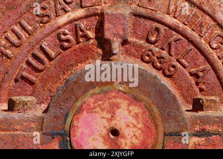 Close Up Detail Of The Trade Name Stamped Onto A 1960s Rusty Metal Tulsa Planetry Winch, UK Stock Photo