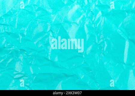 Blue color creased paper texture as background. Stock Photo