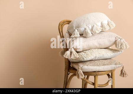 Pillows on chair in room. Closeup Stock Photo