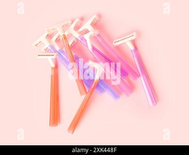 Different razors on pink background, closeup Stock Photo