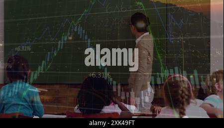 Financial data processing against caucasian female teacher teaching students in a class at school Stock Photo