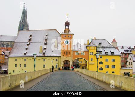 The Old Stone Bridge (Steinerne Brucke) over the Danube River - famous bridge was built in 12th century - Regensburg, Germany Stock Photo